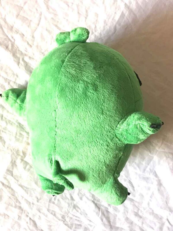 Arrière peluche normale boule verte cochon petites pattes mains oreilles