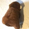 Arrière peluche normale gros singe marron petit bébé bras