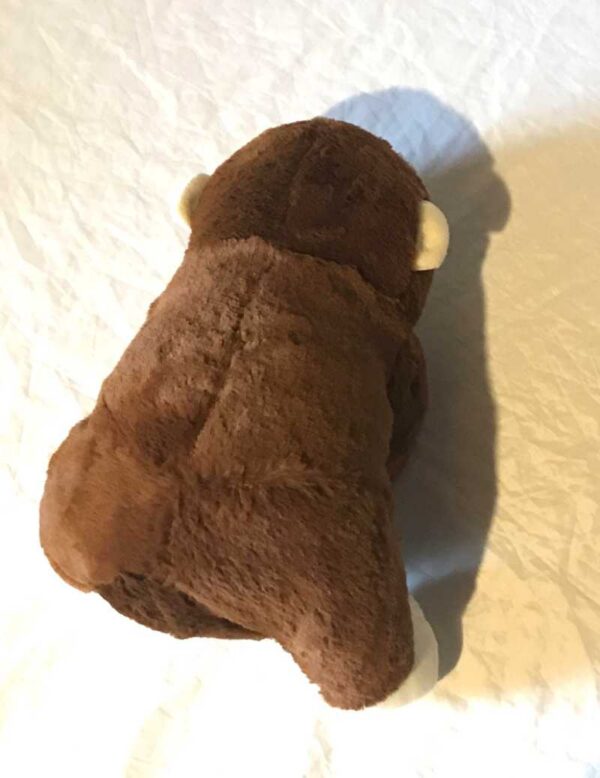 Arrière peluche normale gros singe marron petit bébé bras