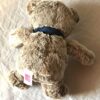 Arrière peluche normale ourson brun ruban bleu nuit étoiles sous pattes boutique enfance-douceur Arrière peluche normale ourson brun ruban bleu nuit étoiles sous pattes