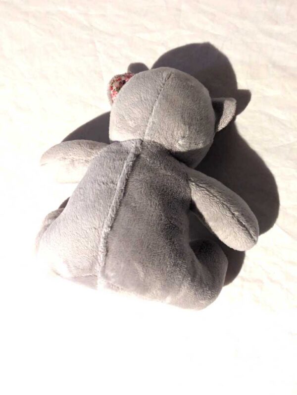 Arrière peluche normale petit ourson gris petites fleurs pattes intérieur oreilles