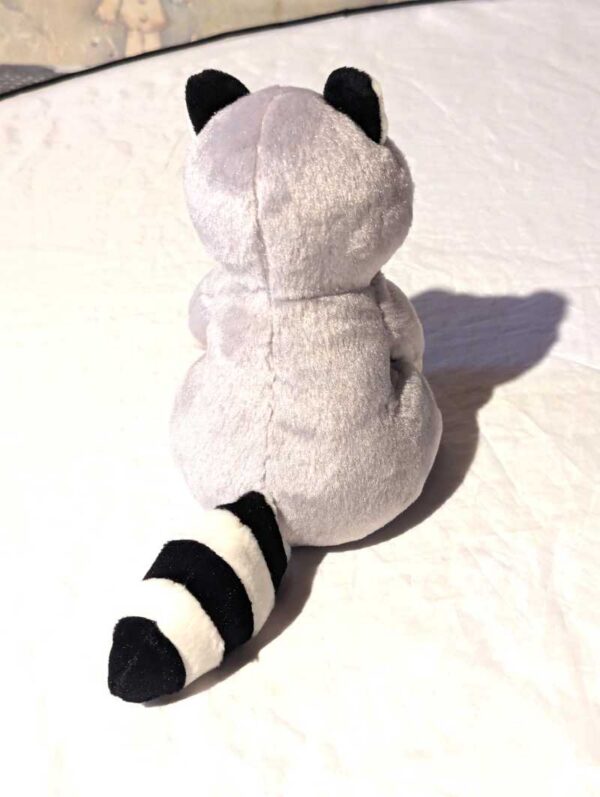 Arrière peluche normale petit raton laveur gris ruban rouge pois blancs