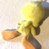 Arrière peluche normale petit titi jaune grand yeux pattes bec oranges