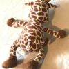 Arrière peluche normale petite girafe blanche marron petit ventre bidon savane