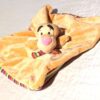 Doudou petit tigrou orange robe écharpe rayures multicolores peluche boutique enfance-douceur Doudou petit tigrou orange robe écharpe rayures multicolores