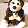 Peluche normale gros singe marron petit bébé bras