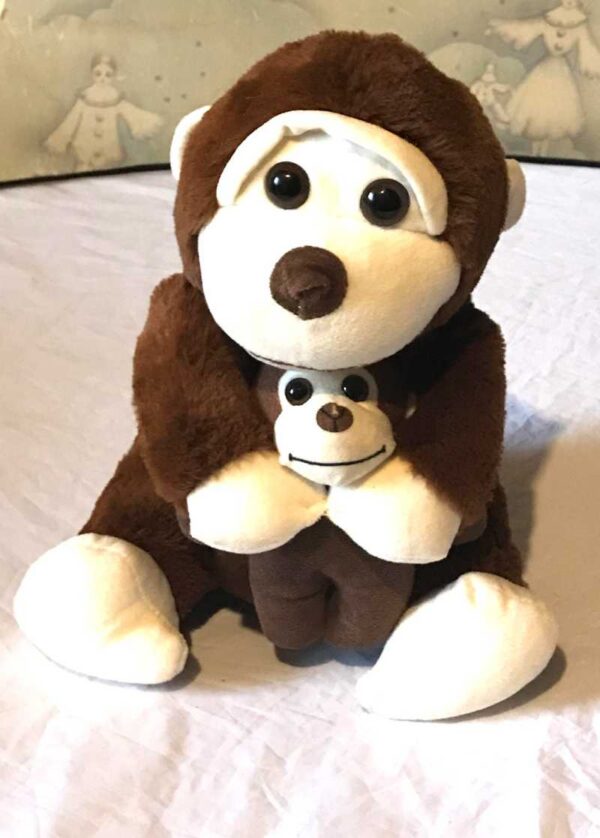 Peluche normale gros singe marron petit bébé bras