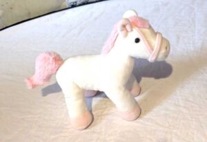 Peluche normale petit cheval blanc crinière harnais pattes roses