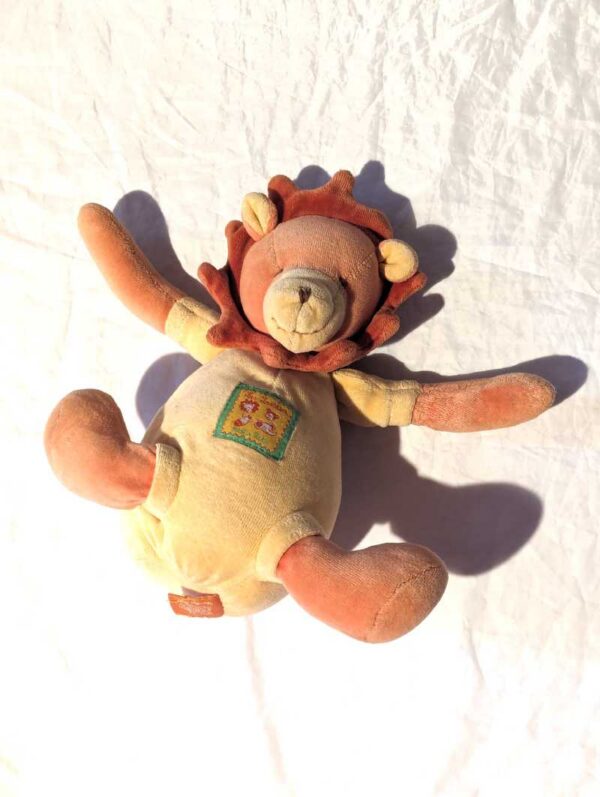 Peluche normale petit ourson marron queue musicale crinière lion