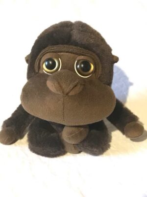 Peluche normale petit singe marron foncé grands yeux sombres