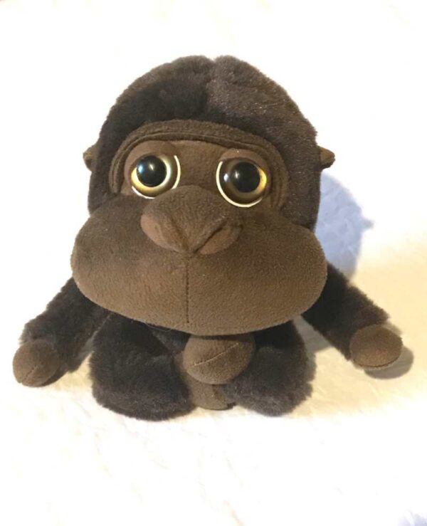 Peluche normale petit singe marron foncé grands yeux sombres