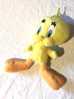 Peluche normale petit titi jaune grand yeux pattes bec oranges